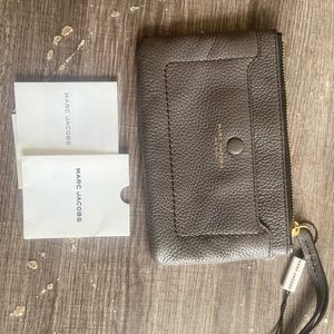 Marc Jacob’s wristlet never used! It’s brand new!